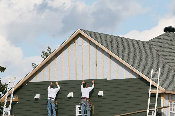 Professional Emergency Siding Repair technician working in Billerica, MA